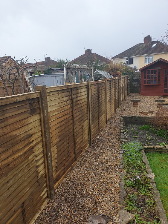 strom damaged fence repaired